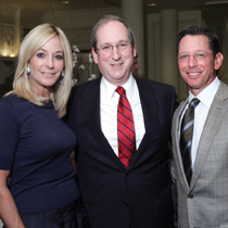 President Fred Lawrence with Heidi and Todd Schuster.