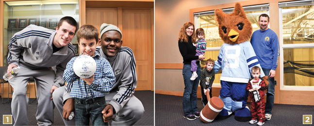 Connor Arnold ’14and Youri Dascy ’14with Sam Bruckner and Danielle (Mogolesko) Dykeman, M.A.’98, M.B.A.’02 and family