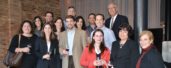 Alumni gathered in the lounge of mk, an acclaimed restaurant in Chicago.