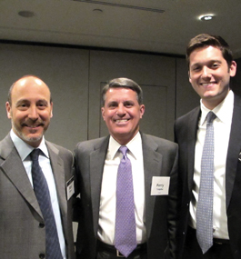 Trustee Perry Traquina ’78 (center), Rob Brown ’88, M.A.’89 (left), and Evan List ’08.