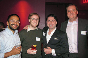 Event chair Arnab Mukherjee ’06, Jon Kay ’07, Seth Schiffman ’95 and Gabriel Garcia, IBS MA’99, chat at the Alumni Club of New York City’s Lesbian, Gay, Bisexual and Transgender Network Happy Hour at Therapy bar.