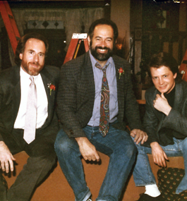 Sam Weisman, Gary David Goldberg and actor Michael J. Fox in the late 1980s.
