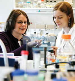 Suzanne Paradis (left) with a student.