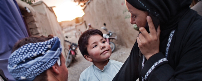 WORK-AROUND: A 6-year-old bacha posh with her mother (right), who was also dressed as a boy when she was a child.