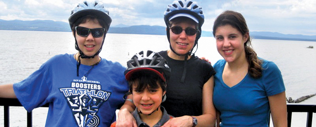 FAMILY HAPPINESS: Biking along Lake Champlain in 2008 with Sarah, Will and Lizzy.