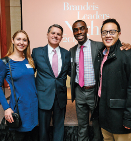 Jessica Willingham '10; Perry Traquina '78, former Board of Trustees chair; Daniel Acheampong '11; and Choon Woo Ha '08, IBS MSF'11.