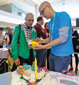 LEADING EDGE: Entrepreneurs explain their wares at the Hassenfeld Family Innovation Center's Innovation Showcase.