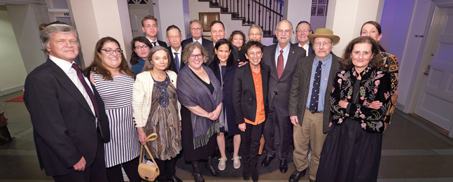 Photo of attendees at Shabbat dinner in Stockholm, Sweden