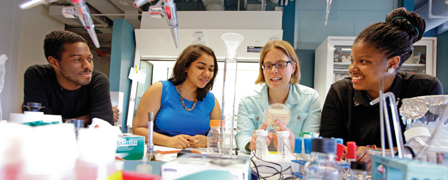 BENCH DEPTH: Biologist Melissa Kosinski-Collins (second from right) with Science Posse students.