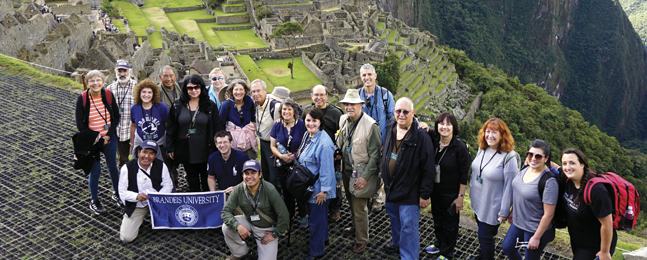 Alumni posing at Machu Picchu
