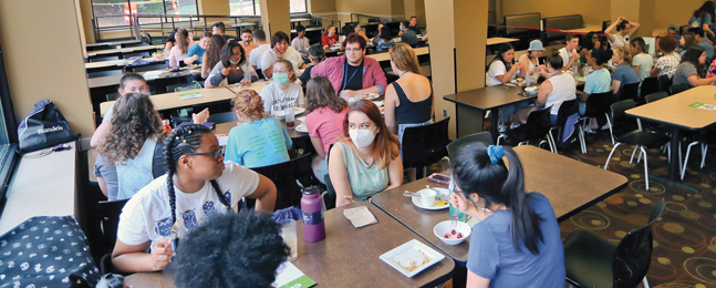 Photo of students eating in a Brandeis dining hall