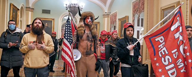 SOWING CHAOS: Insurrectionists inside the U.S. Capitol on  Jan. 6. 2021. 