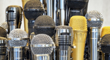 Closeup of several different microphones.
