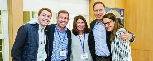 Five people, including President Ron Liebowitz and Jessica Liebowitz, smile at the camera