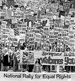A photo of a crowd of protestors, many carrying signs that read "ERA Yes!"