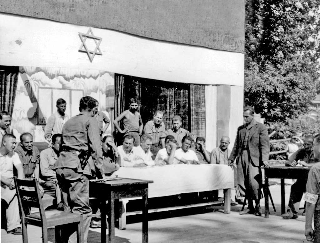 At a German displaced persons camp in 1945, judges hear a case against a fellow DP