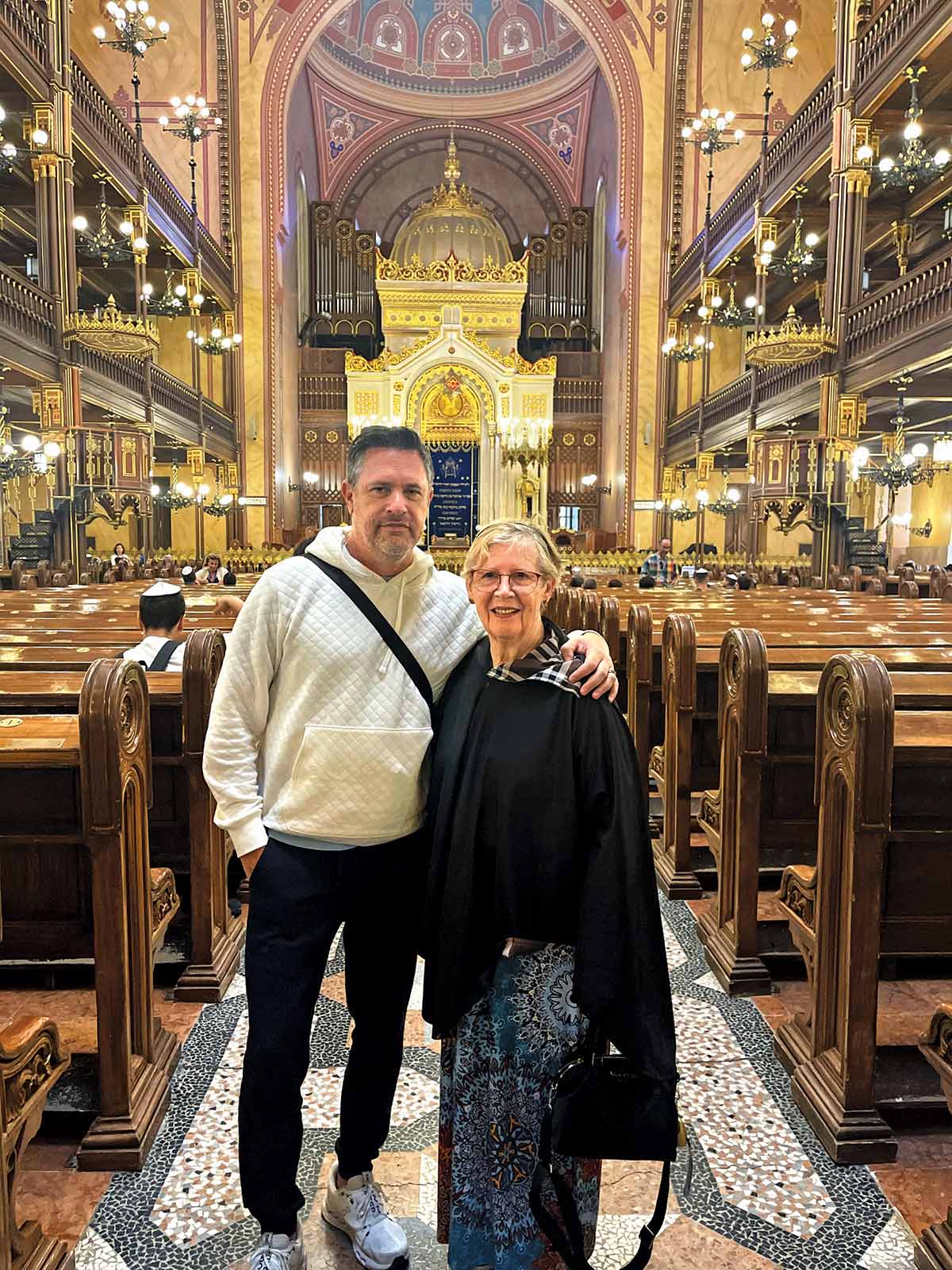 Joel and Karm inside a synagogue