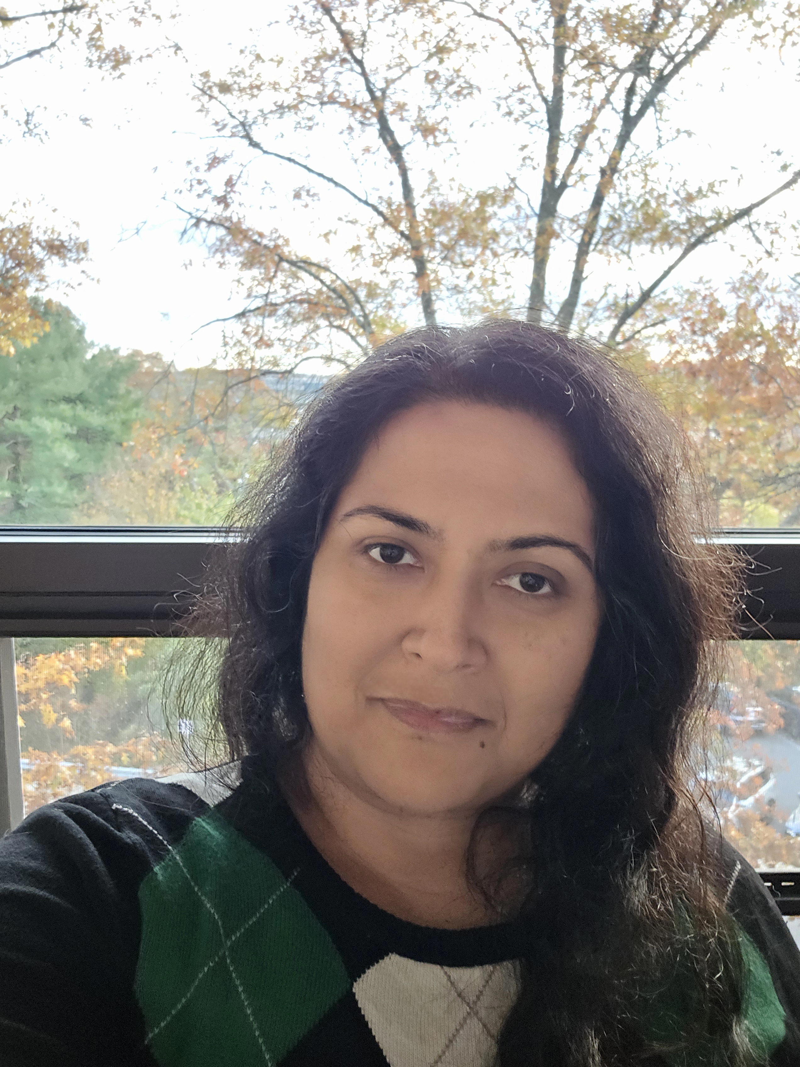 Photo of Esha Senchaudhuri in three quarter profile