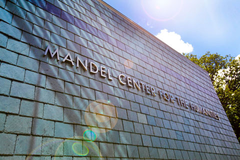 Outside wall of the Mandel Center with lettering that reads "Mandel Center for the Humanities."