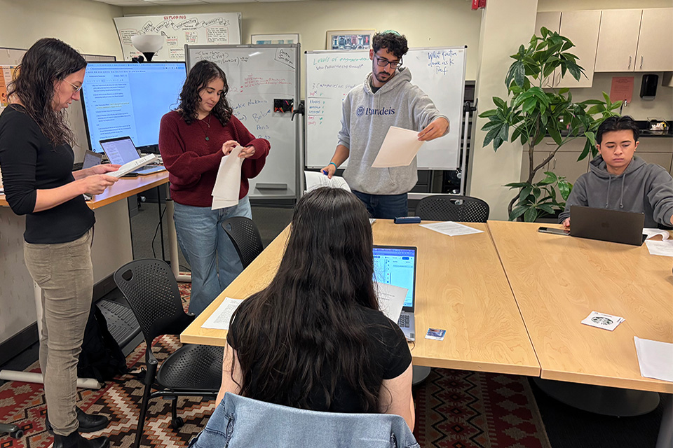 Scroll Lab in action - Ziva and students around table in lab.