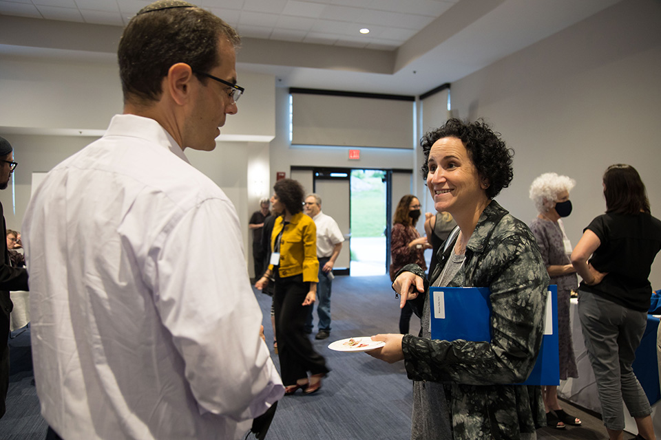 Two participants talking.