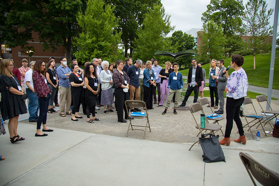 Group standing outside in a circle.