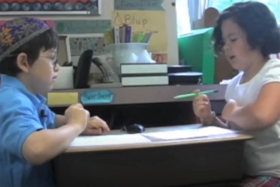 Two students engaged in active listening