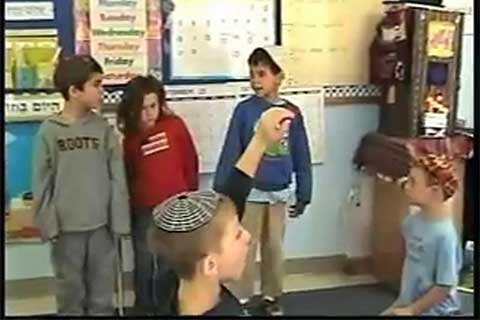 Kids standing in a classroom