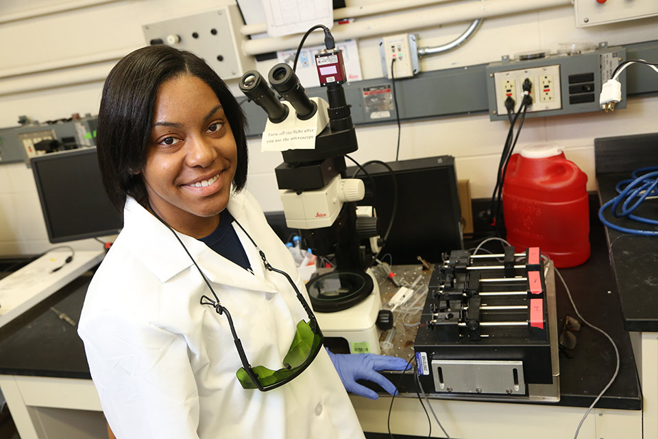 Niya Wilkins in a lab