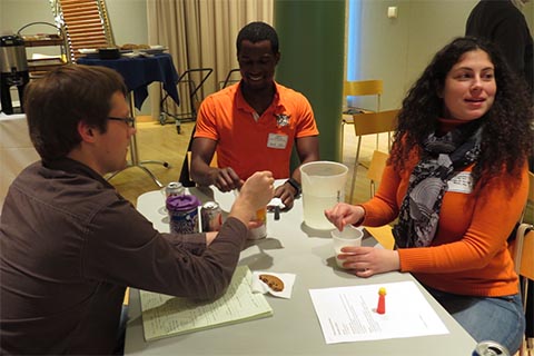 Participants engaged in a small group activity at the 2018 MRSEC retreat.