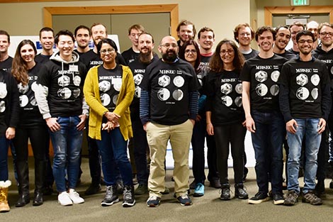 Winter school participants pose for a group picture