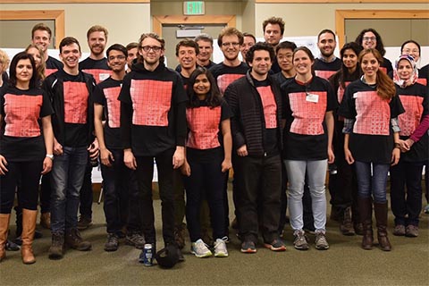 Group photo of participants wearing a winterschool T shirt