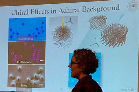 Participant presenting.  Slide is titled: “Chiral Effects in Achiral Background.” 3 pictures are labeled “Fluorescence,” “LC-PolScope” and “Tilted LC-PolScope.”