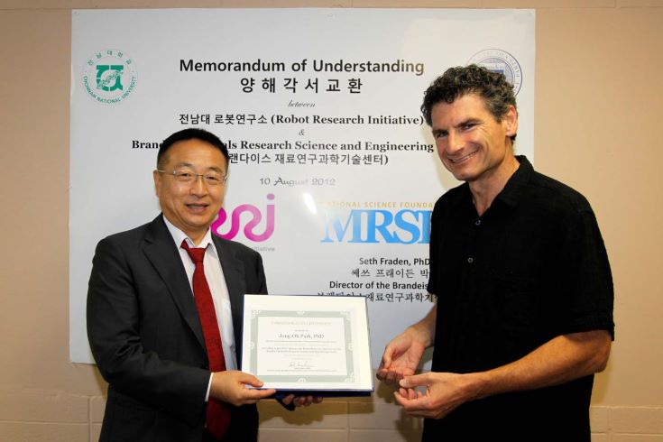 Brandeis MRSEC and Robot Research Initiative collaborators posing with a certificate