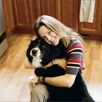 Image of Alex holding her puppy