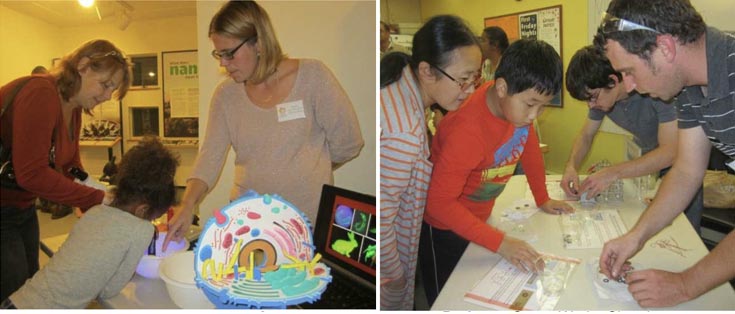 Professor Melissa Kosinski-Collins, Biology running a workshop. Here she is talking to a woman and a child at a table with exhibits.  Right: Professor Casey Wade, Chemistry, doing an experiment with a boy and his mother.