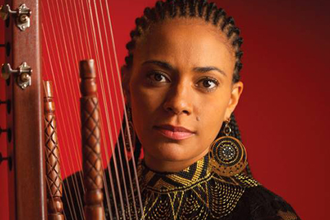 Sona Jobarteh poses with the Kora