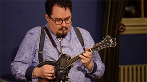 Taylor Ackley plays the mandolin