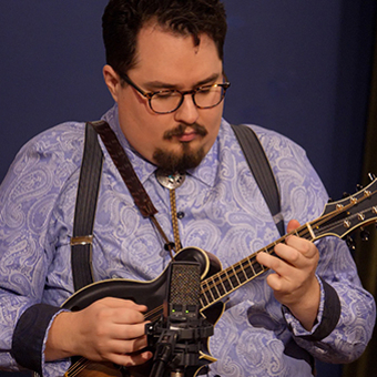 Taylor Ackley plays the mandolin