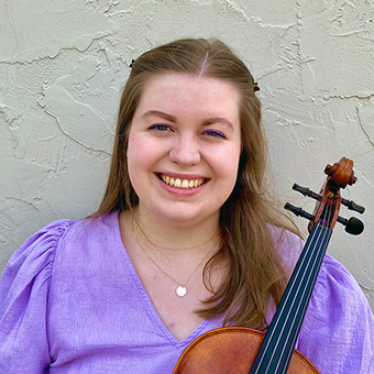 Katie Ball poses with her viola