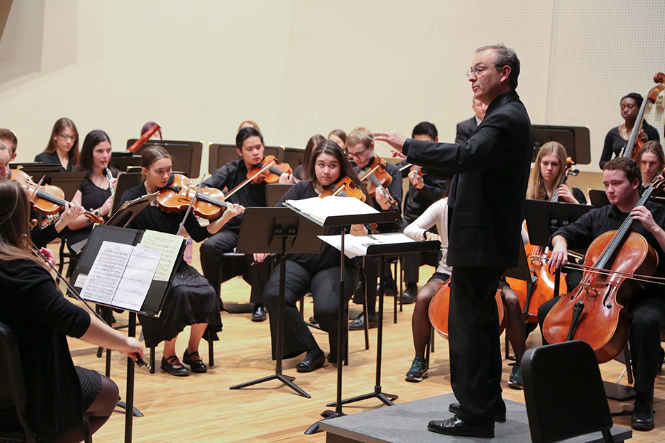 Neal Hampton conducting the Brandeis-Wellesley Orchestra