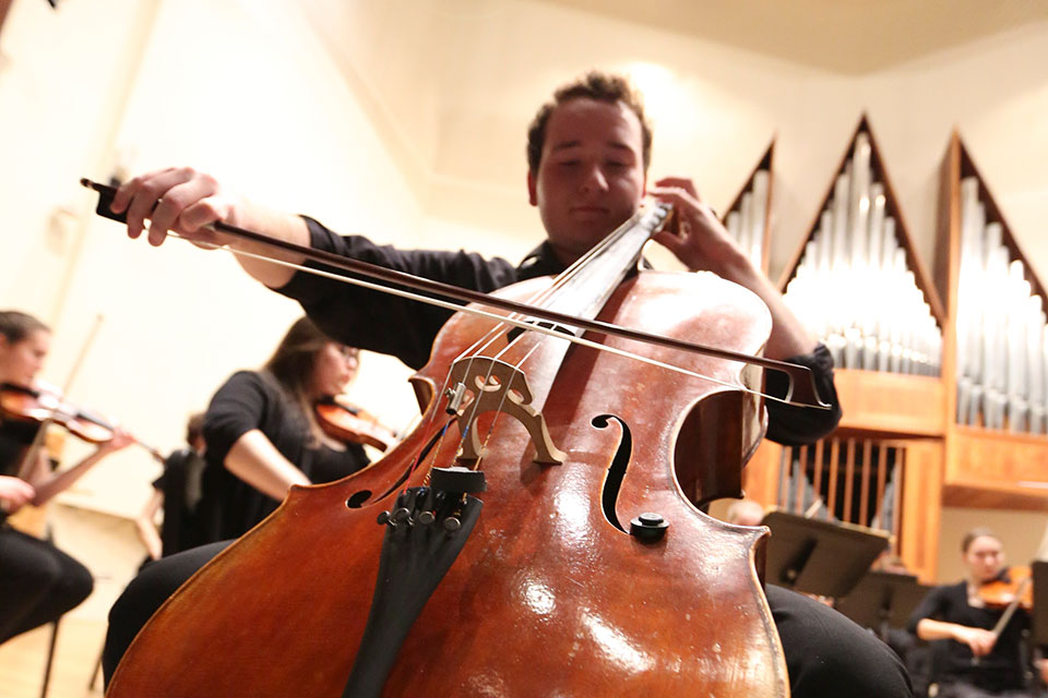 A student playing the cello.