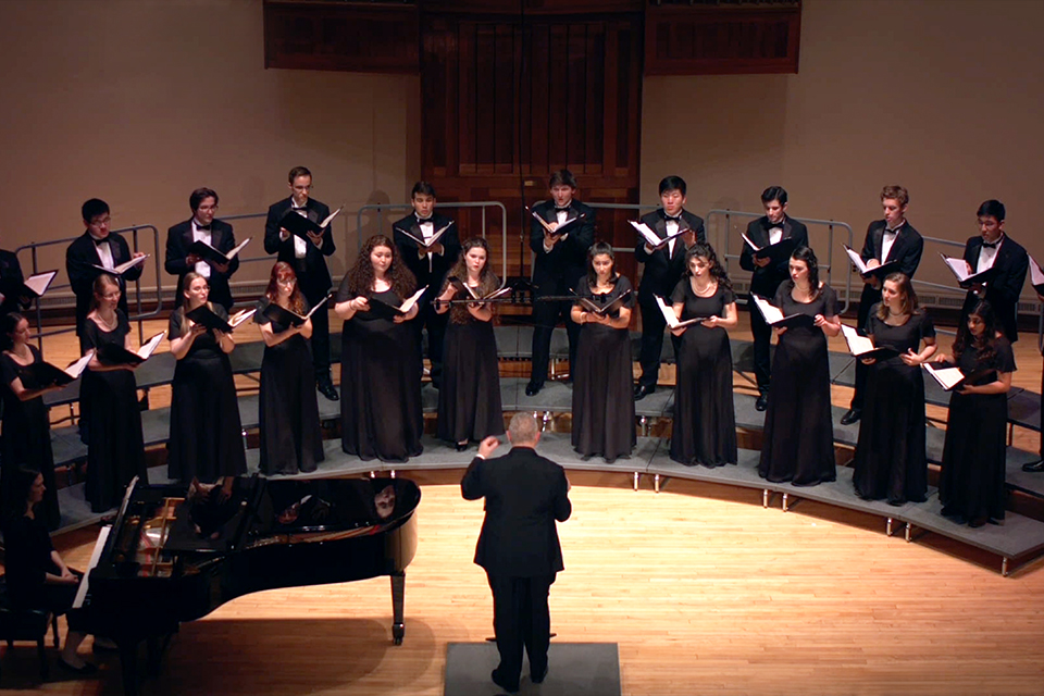 Robert Duff conducting the chorus during a performance