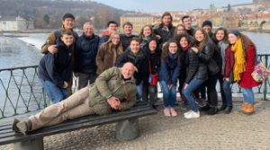 Brandeis Chamber Singers pose casually while on a European Tour
