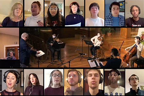 Screenshot of multiple singers surrounding a small ensemble of instrumentalists