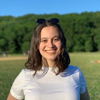 Davina Goodman poses in a field