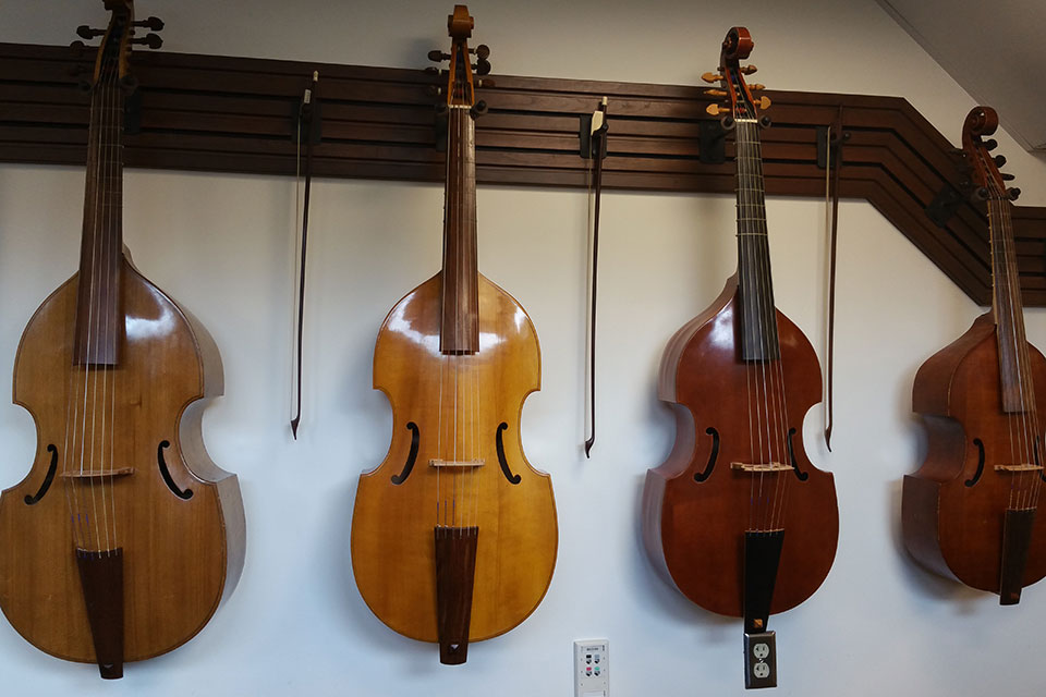 String instruments hanging in the Jencks Room