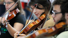 Leonard Bernstein Fellows playing violin