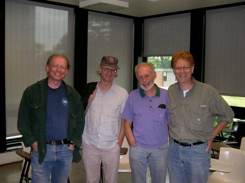 David Rakowski, Lee Hyla, Martin Boykan and Eric Chasalow pose in a Slosberg classroom