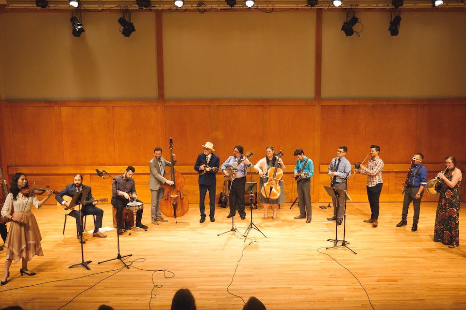 Professor Taylor Ackley performs with a Roots Music Ensemble